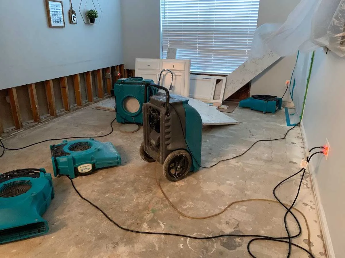 Dehumidifier in flood-cut room for Water Damage Restoration in Annandale